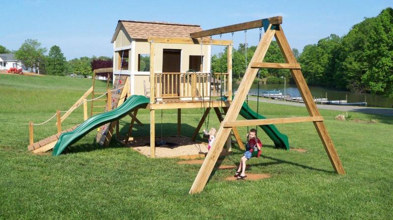playhouse with swing set