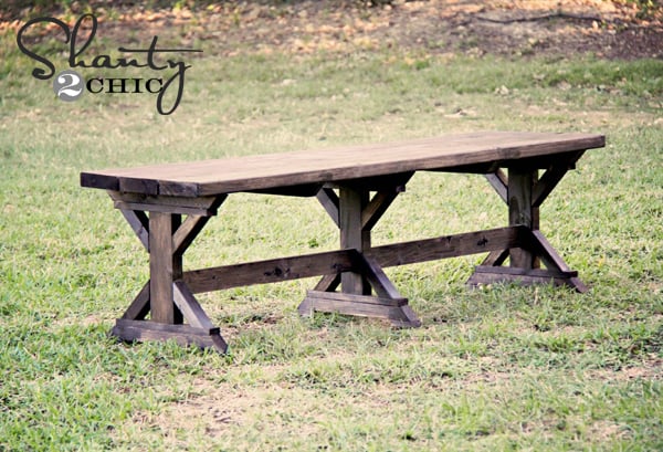 farmhouse bench with three legs and supports
