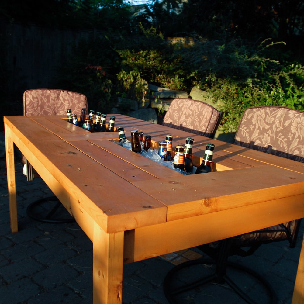 Patio Table with Built-in Beer/Wine Coolers with beer