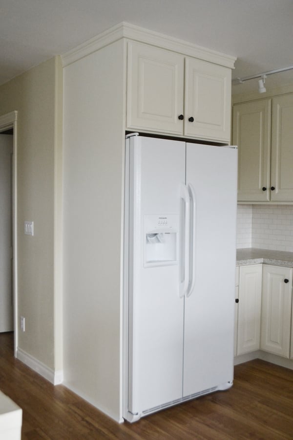 boxing in fridge with cabinetry - momplex vanilla kitchen | ana white