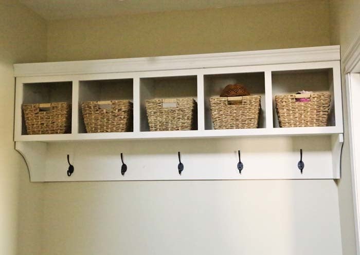 entryway shelf with hooks and baskets