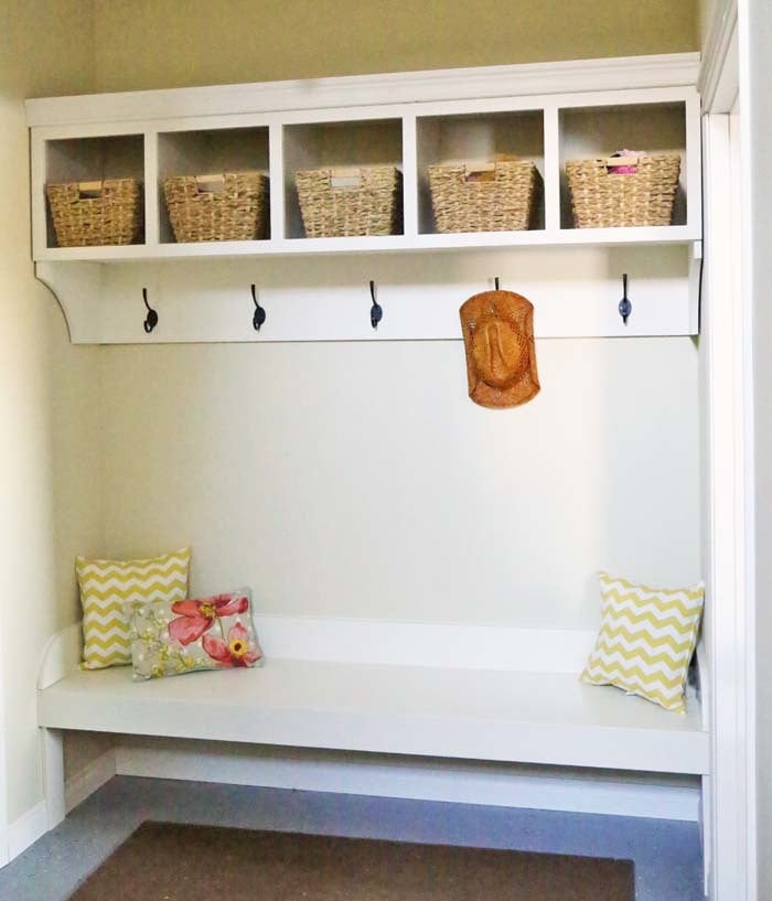 entryway shelf with hooks and baskets