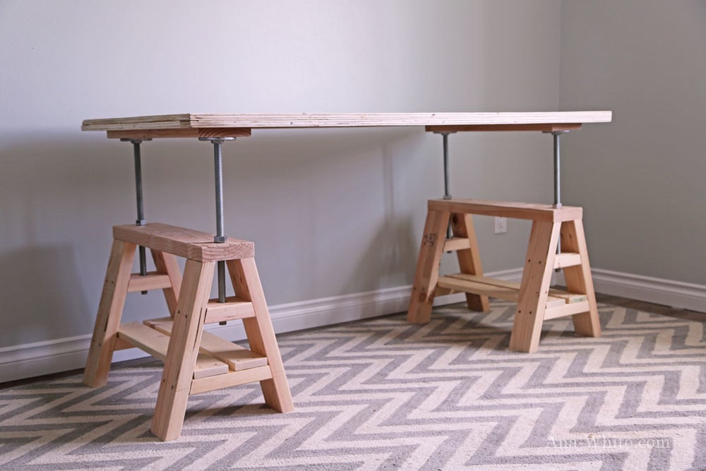 Desk to coffee table with industrial style sawhorses - free plans from 