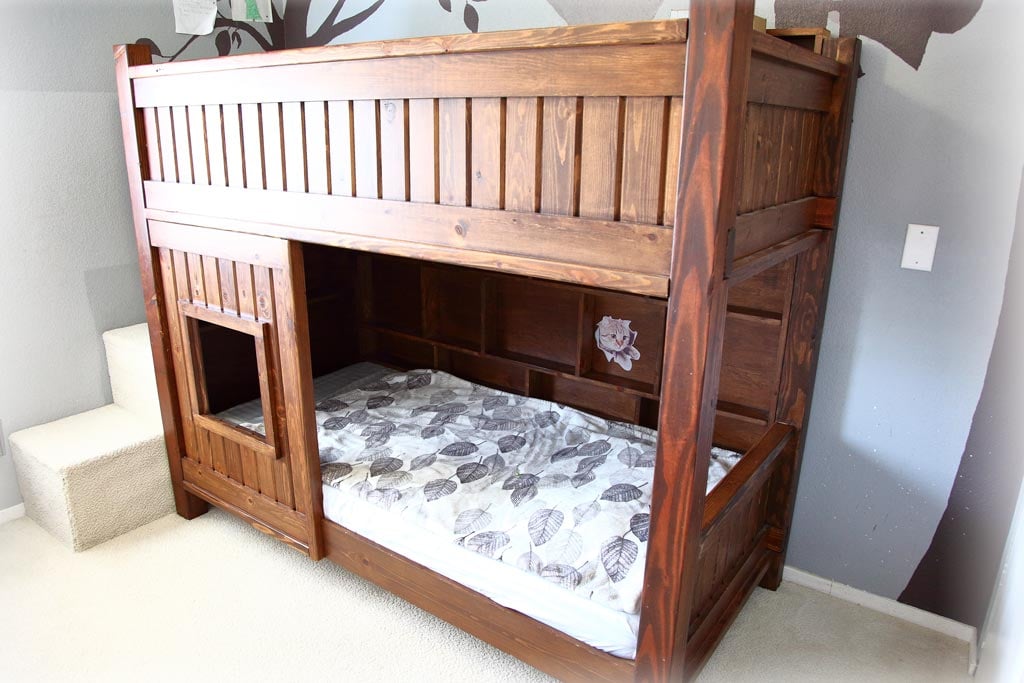 Custom stained wood bunk bed with stairs