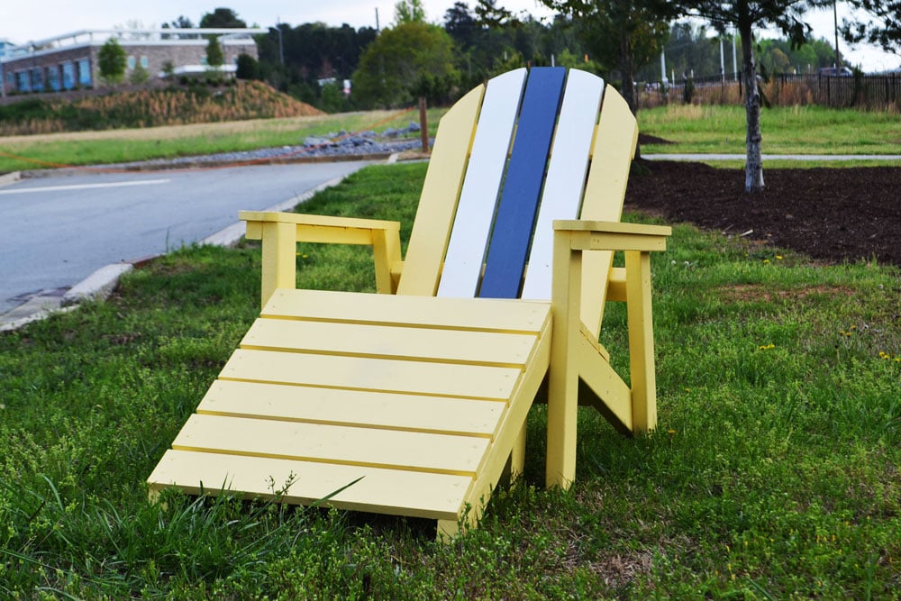 yellow adirondack chair with footstool