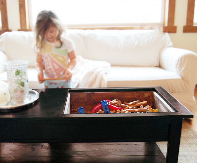 coffee table opened up revealing hidden storage