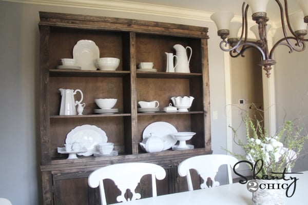 farmhouse style hutch with white dishes