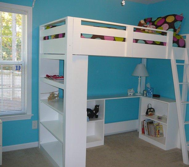 bunk bed with bed underneath