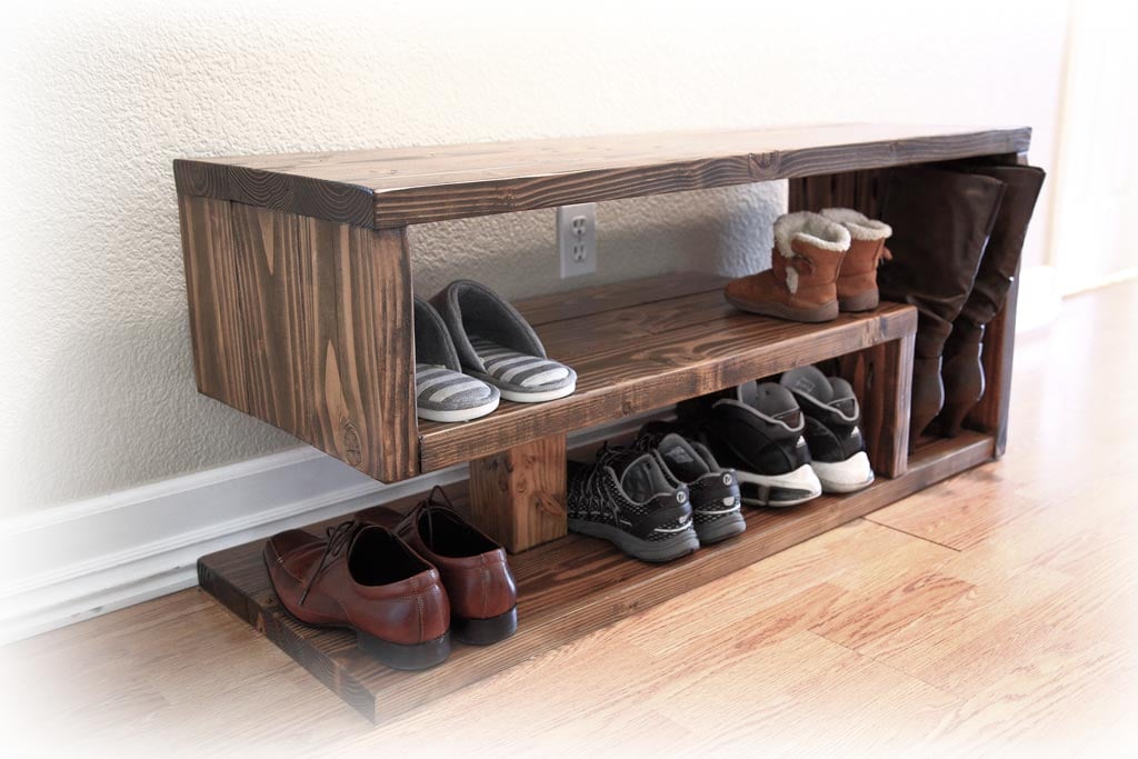 modern shoe rack with three rows made of stained wood