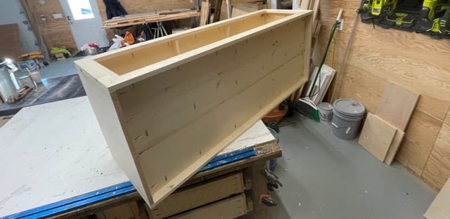 attaching bottom shelf