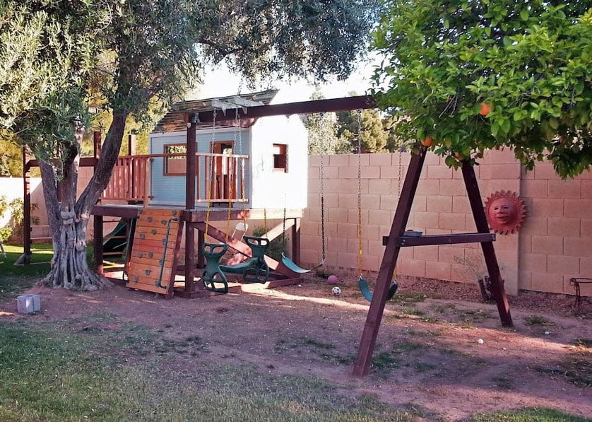 swing set on playhouse