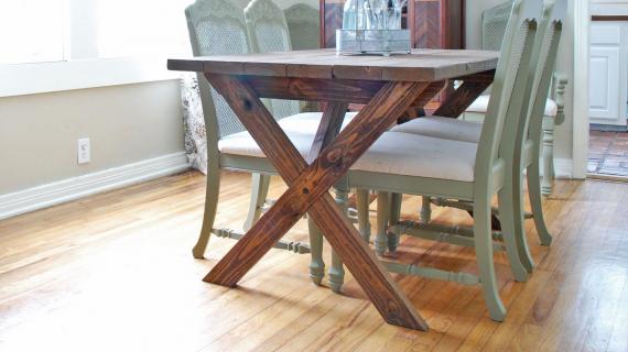 dark stained rustic X table in a pretty dining room